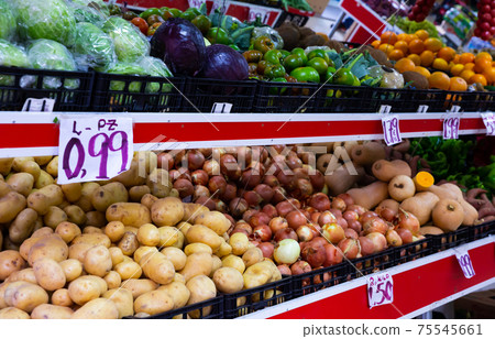 Shelves with variety testy vitamin products in fruit and vegetables department in the supermarket Shelves with variety testy vitamin products in fruit and vegetables department in the supermarket 75545661