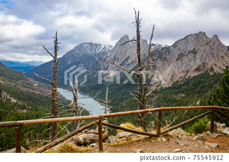Els Encantats flowed in Estany de Sant Maurici in Espot in Spain 75545912