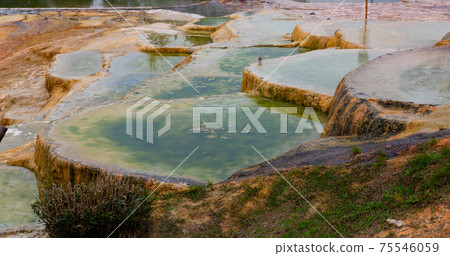 Travertine terraces with hot water of Karahyit Red Springs, Turkey Travertine terraces with hot water of Karahyit Red Springs, Turkey 75546059