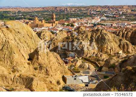 Neighborhood with troglodyte cave houses, Guadix, Spain Neighborhood with troglodyte cave houses, Guadix, Spain 75546572
