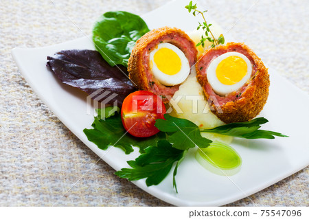 Scotch eggs with vegetables Scotch eggs with vegetables 75547096