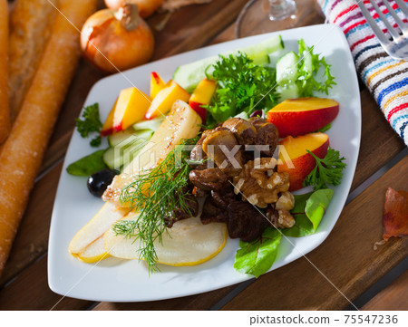 Salad with chicken hearts and fried cheese Salad with chicken hearts and fried cheese 75547236