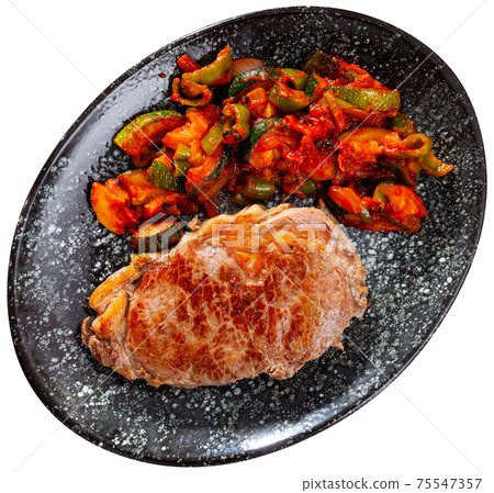 Beef with stewed vegetables and spices 75547357