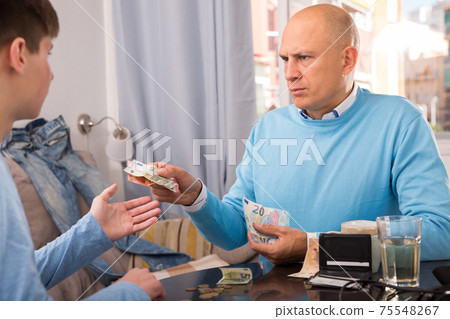Guy asking his father pocket money Guy asking his father pocket money 75548267