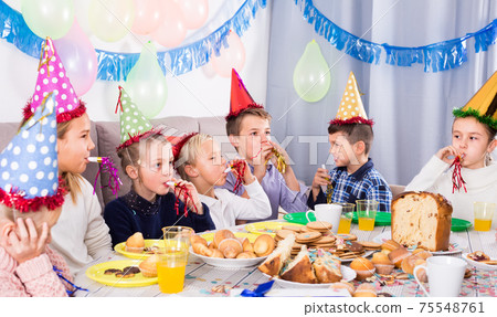 glad children having a good time at a birthday party glad children having a good time at a birthday party 75548761