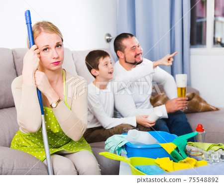 Tired woman with relaxing man with boy Tired woman with relaxing man with boy 75548892