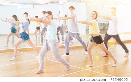 Active teens learn new dance moves in studio Active teens learn new dance moves in studio 75549005