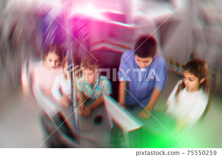 Enthusiastic children play in the quest room of inscrutable bunker Enthusiastic children play in the quest room of inscrutable bunker 75550259