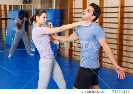 People practicing self defense techniques People practicing self defense techniques 75551351