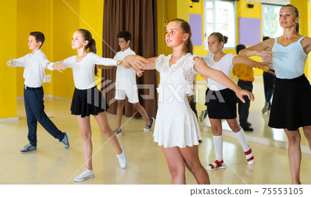 Group of children are dancing rock-n-roll 75553105