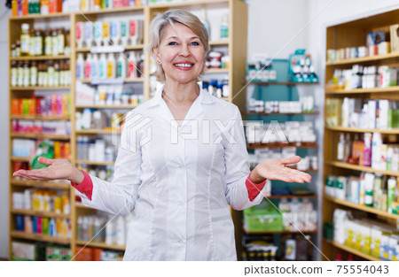 Female checking assortment of cosmetics in shop Female checking assortment of cosmetics in shop 75554043