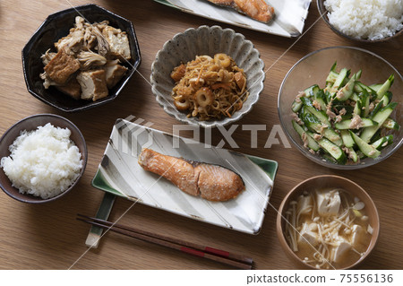 Grilled salmon, dried daikon radish, simmered maitake mushrooms and fried tofu, cucumber and tuna sauce 75556136