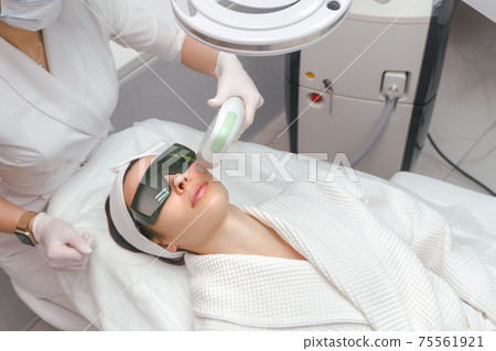 ultraformer lifting. Face Skin Care. Close-up Of Woman Getting Facial Hydro Microdermabrasion Peeling Treatment At Cosmetic Beauty Spa Clinic. Hydra Vacuum Cleaner. Exfoliation, Rejuvenation And 75561921