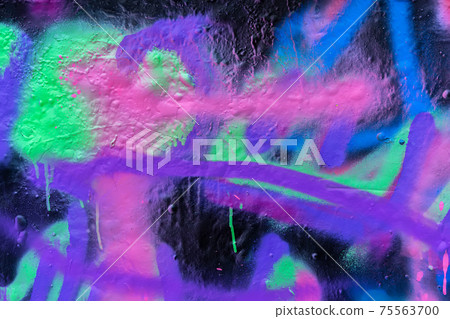 Abstract colorful wall background. Detail of graffiti. Scribble of colored paint. Bright color, wall surface 75563700