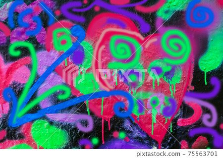 Abstract background with scribbles, stains, scratched texture of wall, colored paint of graffiti with heart 75563701