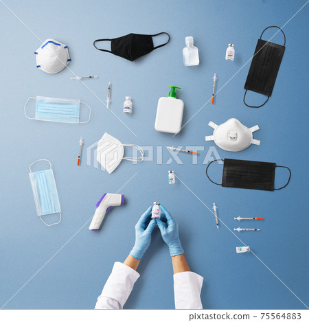Hand with syringe injection, covid-19 and vaccination concept. Hand with syringe injection, covid-19 and vaccination concept. 75564883