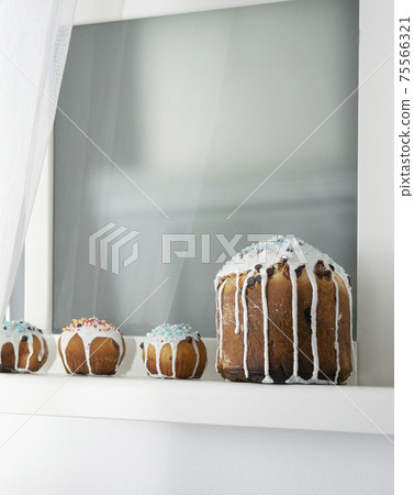 Easter cakes on the window. composition Easter cakes on the window. composition 75566321