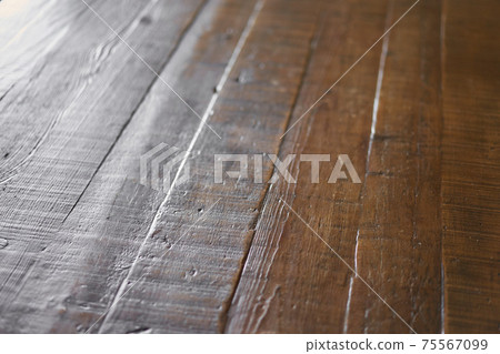 Brown wood table close-up Brown wood table close-up 75567099