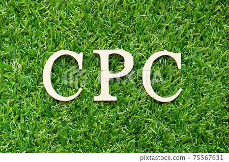 Alphabet letter in word CPC (Abbreviation of Cost per click) on green grass background Alphabet letter in word CPC (Abbreviation of Cost per click) on green grass background 75567631