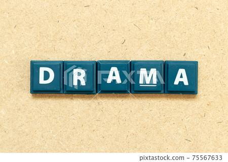Tile alphabet letter in word drama on wood background Tile alphabet letter in word drama on wood background 75567633