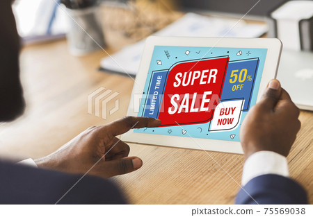 Cropped image of businessman touching digital tablet screen, shopping online 75569038