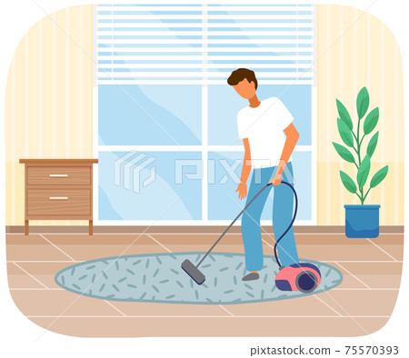 Young man uses vacuum cleaner in living room. Daily routine, house cleaning, man is vaccuming 75570393