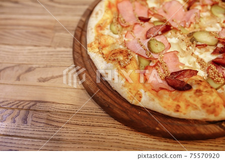 Pizza on wooden table top view. Fast food. Post blog social media. with copy space. Pizza ready to eat 75570920
