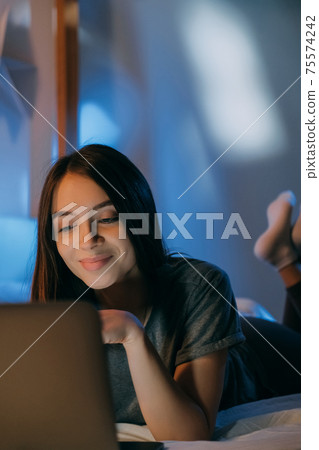 night video call woman laptop virtual chat bed night video call woman laptop virtual chat bed 75574242