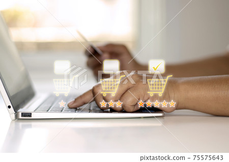 Business women press laptop keyboards to place orders online, appraise ideas, make decisions and online shopping. Business women press laptop keyboards to place orders online, appraise ideas, make decisions and online shopping. 75575643