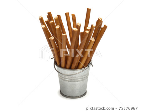 Sweet straws. Dry baked goods in the form of thin sticks 75576967
