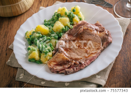 Beef steak with mixed vegetables. High quality photo. Beef steak with mixed vegetables. High quality photo. 75577343