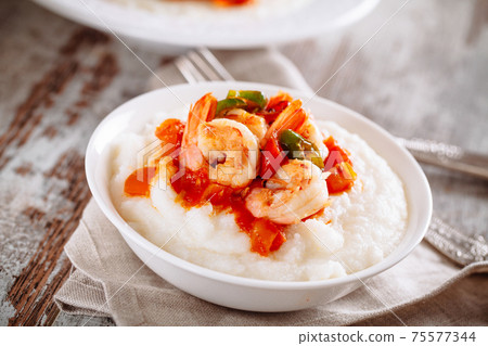 Shrimp and Grits on a plate. . High quality photo Shrimp and Grits on a plate. . High quality photo 75577344