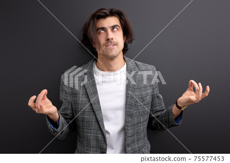 crazy guy try to keep calm in stressful situation crazy guy try to keep calm in stressful situation 75577453