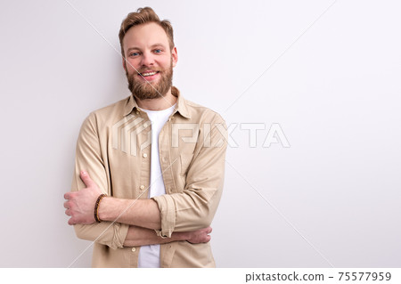 Young Caucasian Bearded Guy In Casual Wear Posing At Camera 75577959