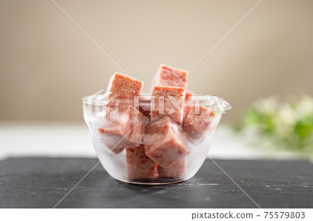 Frozen dice steak thawed at room temperature Frozen dice steak thawed at room temperature 75579803