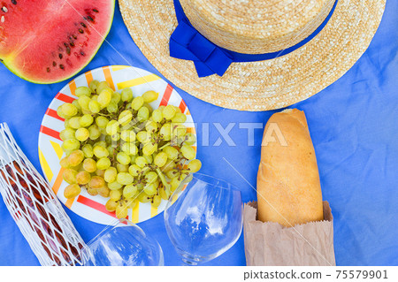 bright summer picnic. hat, glasses, grapes, watermelon 75579901