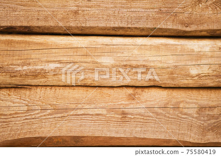 Old natural uncolored wooden wall surface. Background photo texture 75580419