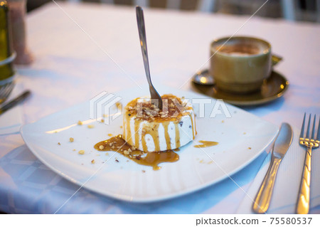 Very tasty dessert in a cheesecake cafe 75580537