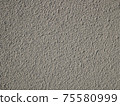 Detail of bumpy concrete wall painted in gray color 75580999