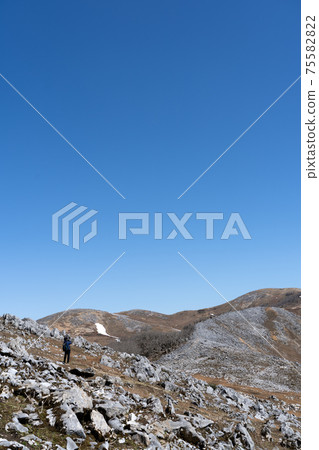 Southwestern ridge of Mt. Ryozen showing the characteristics of karst terrain 75582822