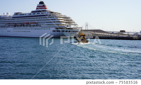 A luxury liner anchored at the Port of Yokohama and the Great Pier A luxury liner anchored at the Port of Yokohama and the Great Pier 75583516