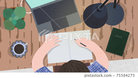 A man who spreads his computer and notebook on his desk and works 75584273