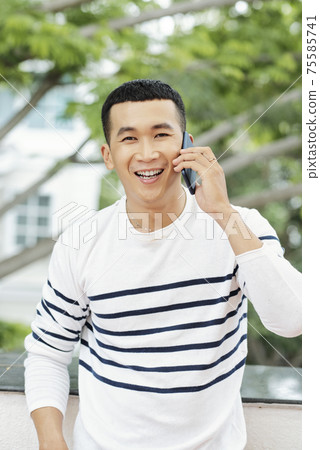 Man talking on the phone Man talking on the phone 75585741