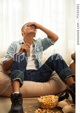 Man suffering from hangover Man suffering from hangover 75585801