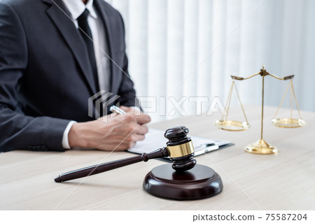 Judges gavel, Professional male lawyers work at a law office There are scales, Scales of justice, judges gavel, and litigation documents. Concepts of law and justice Judges gavel, Professional male lawyers work at a law office There are scales, Scales of justice, judges gavel, and litigation documents. Concepts of law and justice 75587204
