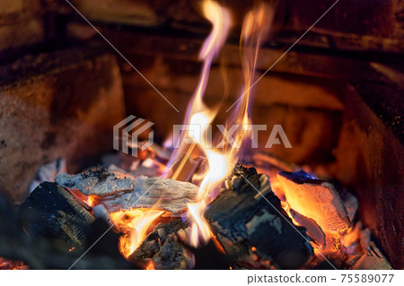 Fire flame burning coal and wood in fireplace 75589077