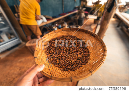 Home-made roasted coffee beans Home-made roasted coffee beans 75589396