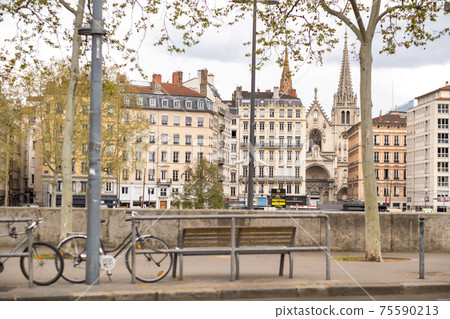 LYON, FRANCE-APRIL 7, 2919: Embankment of the River Saone on the bridge in the city of Lyon 75590213