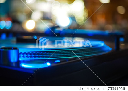 DJ vinyl players in dark nightclub, party in the dance club 75591036