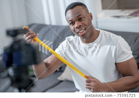 African american young man having an online tutorial African american young man having an online tutorial 75591725